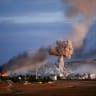 Smoke and flames rise over the Syrian border town of Kobani after an airstrike, October 20, 2014