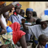 A woman rescued from Boko Haram in Sambisa forest celebrates her freedom from Boko Haram at Malkohi camp for Internally Displaced People in Yola, Adamawa State, Nigeria 