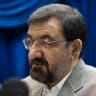 Iranian secretary of the Expediency Council arbitration body Mohsen Rezaei speaks during a news conference in Tehran