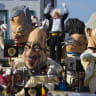 Giant figures depicting Belgian Prime Minister Charles Michel (C) and other politicians are seen during the 87th carnival parade of Aalst February 15, 2015. The Aalst Carnival, which is inscribed on the Representative List of the Intangible Cultural Heritage of Humanity, often shows informal groups 
