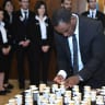 Freshman Knesset member Gadi Yevarkan lights a candle in memory of the victims of the Holocaust at the Knesset's annual “Every Person Has a Name” ceremony, May 2 2019.