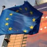 A European Union flag flies outside the European Commission headquarters in Brussels, Belgium, December 19, 2019.