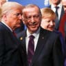 US President Donald Trump and Turkey's President Recep Tayyip Erdogan leave the stage after family photo during the annual NATO heads of government summit at the Grove Hotel in Watford, Britain December 4, 2019