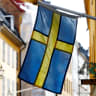 The Swedish flag is seen at Gamla Stan, the Old City of Stockholm, Sweden, May 7, 2017.