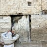 An ultra-Orthodox jew prays at the Westen Wall July 17, 2002 on Tisha B'Av