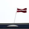 National flag flutters over Latvian central bank headquarters in Riga, Latvia April 9, 2019.