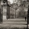 The main gate to Auschwitz with slogan 'Arbeit Macht Frei'