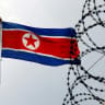  A North Korea flag flutters next to concertina wire at the North Korean embassy in Kuala Lumpur, Malaysia March 9, 2017.