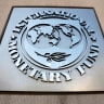 International Monetary Fund logo is seen outside the headquarters building during the IMF/World Bank spring meeting in Washington, US, April 20, 2018.