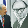  BENJAMIN NETANYAHU walks in front of a poster of Menachem Begin at the Begin Heritage Center in Jerusalem. 