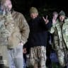  Ukrainian prisoners of war (POWs) smile after a swap in Chernihiv region