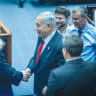  LIKUD LEADER BENJAMIN Netanyahu shakes hands with United Torah Judaism MK Yitzhak Goldknopf in the Knesset last week. If Netanyahu’s promise of a full budget for all haredi educational institutions is realized, the already-low incentive to provide core studies will disappear entirely.