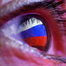 A Russian flag is reflected in an eye in this picture illustration taken October 4, 2018.