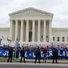  United States Capitol Police lines up along the perimeter while LGBTQ activists and supporters hold a rally on the steps of the Supreme Court as it hears major LGBT rights case on whether federal employment law that outlaws discrimination on the basis of sex covers sexual orientation and gender ide