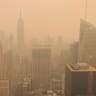  A view from the top of the Rockefeller Center, as haze and smoke caused by wildfires in Canada hang over the Manhattan skyline, in New York City, New York, US, June 7, 2023. 