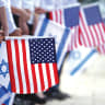  JERUSALEM SCHOOLCHILDREN hold Israeli and American flags during a rehearsal for former US President Barack Obama’s visit to Israel in 2013.
