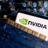   A smartphone with a displayed NVIDIA logo is placed on a computer motherboard in this illustration taken March 6, 2023
