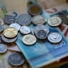   New Israeli Shekel banknotes and coins are seen in this picture illustration taken November 9, 2021.