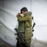  Family and friends of Israeli soldier St.-Sgt.-Maj. (res.) Zvika Lavi mourn at his funeral at the Mount Herzl Military Cemetery in Jerusalem on December 12, 2023, Lavi succumbed to his wounds last night after being wounded fighting in the Gaza Strip. 