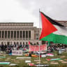  Demonstrators sit in an encampment as they protest in solidarity with Pro-Palestinian organizers on the Columbia University campus, amid the ongoing conflict between Israel and Hamas, in New York City, US. April 19, 2024.