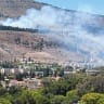 Smoke is seen from rockets fired from Lebanon, near Kiryat Shmona in northern Israel on June 1, 2024. 