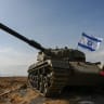  IDF soldiers but up a checkpoint on a road near the Syrian border, northern Golan Heights on October 7, 2023.