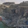 Rescue teams stand amid rubble in the aftermath of an earthquake in a location given as Shigatse City, Tibet Autonomous Region, China, January 7, 2025, in this screengrab obtained from a handout video. 
