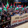  People take part in a pro-Palestinian protest at Aotea Square in Auckland, New Zealand, October 14, 2023.