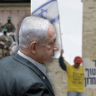  Prime Minister Benjamin Netanyahu seen over a background of Hamas terrorists and Israeli protesters (illustrative)