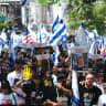AN ISRAEL Day event on Fifth Avenue in Manhattan takes place last June. There is a significant increase in the number of Diaspora Jews who identify with Israel and show increased involvement in Jewish activity in their community, according to a JPPI survey cited by the writer.