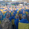  Ukrainian prisoners of war (POWs) are seen next to buses after a swap, amid Russia's attack on Ukraine, in an undisclosed location, Ukraine April 19, 2025.