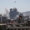  Smoke rises after strikes on Syria's defense ministry in Damascus, according to Al Jazeera TV, in Damascus, Syria July 16, 2025. 