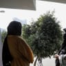 FILE PHOTO: Two Afghan women in interview with Reuters.
