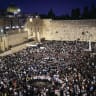 Worshipers are seen at the Western Wall in Jerusalem on Tisha B'Av.