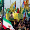 Mourners attend the funeral of Haider al-Moussawi, head of the security unit in the Shi'ite armed group Kataib Sayyid al-Shuhada, and senior Hezbollah figure Abu Ali Khalil, who were killed in an Israeli airstrike on Tehran, amid the Iran-Israel conflict, in Baghdad, Iraq, June 22, 2025.
