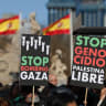 People hold anti-war placards during a protest to call for a ceasefire in Gaza to mark 100 days since the start of the conflict between Israel and the Palestinian Islamist group Hamas, in Madrid, Spain, January 20, 2024; Illustrative.
