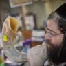 A man blows the shofar in the Mea Shearim neighborhood of Jerusalem, ahead of the Jewish holiday of Rosh Hashanah, September 17, 2025