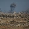 Smoke rises following an Israeli military strike in Gaza City, as seen from the central Gaza Strip, October 6, 2025.