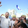 Avinatan Or returns home to hundreds cheering for him, October 21, 2025.