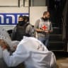 Members of the Red Cross watch while Israel Prison Service officers prepare Palestinian prisoners for release as part of a hostage deal between Israel and Hamas, at Ktzi’ot Prison in southern Israel, February 26, 2025.