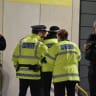 Police at the scene of a stabbing at a train station in Manchester, UK, December 2018; illustrative.