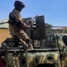ILLUSTRATIVE: A Nigerian soldier stands on a military truck, during the tour of the Theatre Command Operation Lafiya Dole by Nigeria's Chief of Army Staff, at the Maimalari Cantonment in Maiduguri, Borno, Nigeria, November 7, 2025