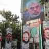 A billboard of slain Hamas leader Yahya Sinwar is displayed on a building in a street in Tehran, Iran, August 12, 2024