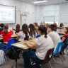 Students participate in a class at Denver Jewish Day School, where increased enrollment has led to fuller classrooms.