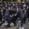 Ultra-Orthodox Jews scuffle with police during a protest against the drafting of haredi jews, outside an IDF Recruitment Center in Jeursalem, November 12, 2025