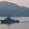 Turkish Navy's rescue ship TCG Isin sails in the Bosphorus as the Palau-flagged bulk carrier MKK1, carrying grain under UN’s Black Sea grain initiative, is seen drifted aground in Istanbul, Turkey January 16, 2023