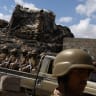 YEMENI SOLDIERS stand guard at a military camp near the frontline with Houthis, in Marib, Yemen, November 6, 2024.