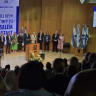 International spiritual leaders stand on stage at a Jerusalem Prayer Breakfast event at the Knesset auditorium marking 600 days since the start of the war, May 28, 2025.