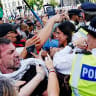 POLICE OFFICERS stand guard as demonstrators attend the "Lift The Ban" rally organised by Defend Our Juries, challenging the British government's proscription of "Palestine Action" under anti-terrorism laws, in Parliament Square, in London, Britain, September 6, 2025.