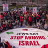 Demonstrators from the group Jewish Voice for Peace hold an emergency Passover Seder outside of ICE headquarters on April 14, 2025 in New York City. The group is calling for freedom for Palestine, the release of Mahmoud Khalil, and to protest President Trump.